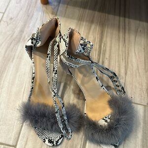 New never worn snake print heels